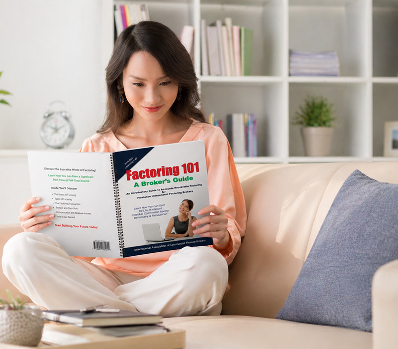 Woman reading Factoring 101 from Amazon